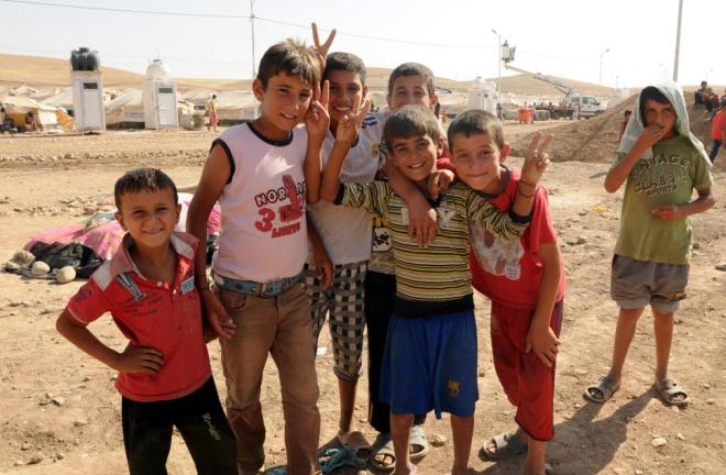 Niños sirios sonríen a pesar de la catástrofe